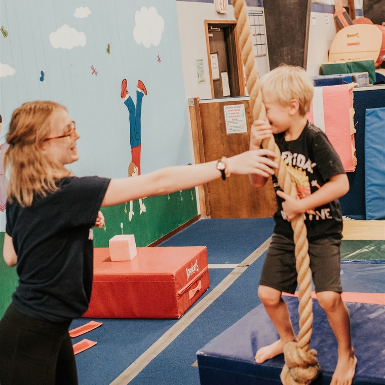 Rope climb in the preschool gym