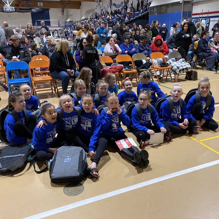 North Coast athletes in team warm-ups at a meet